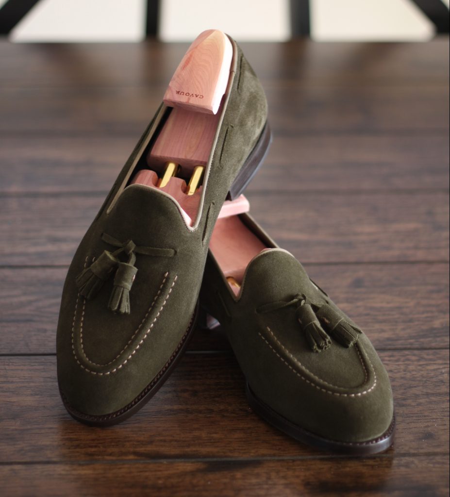 green suede loafers